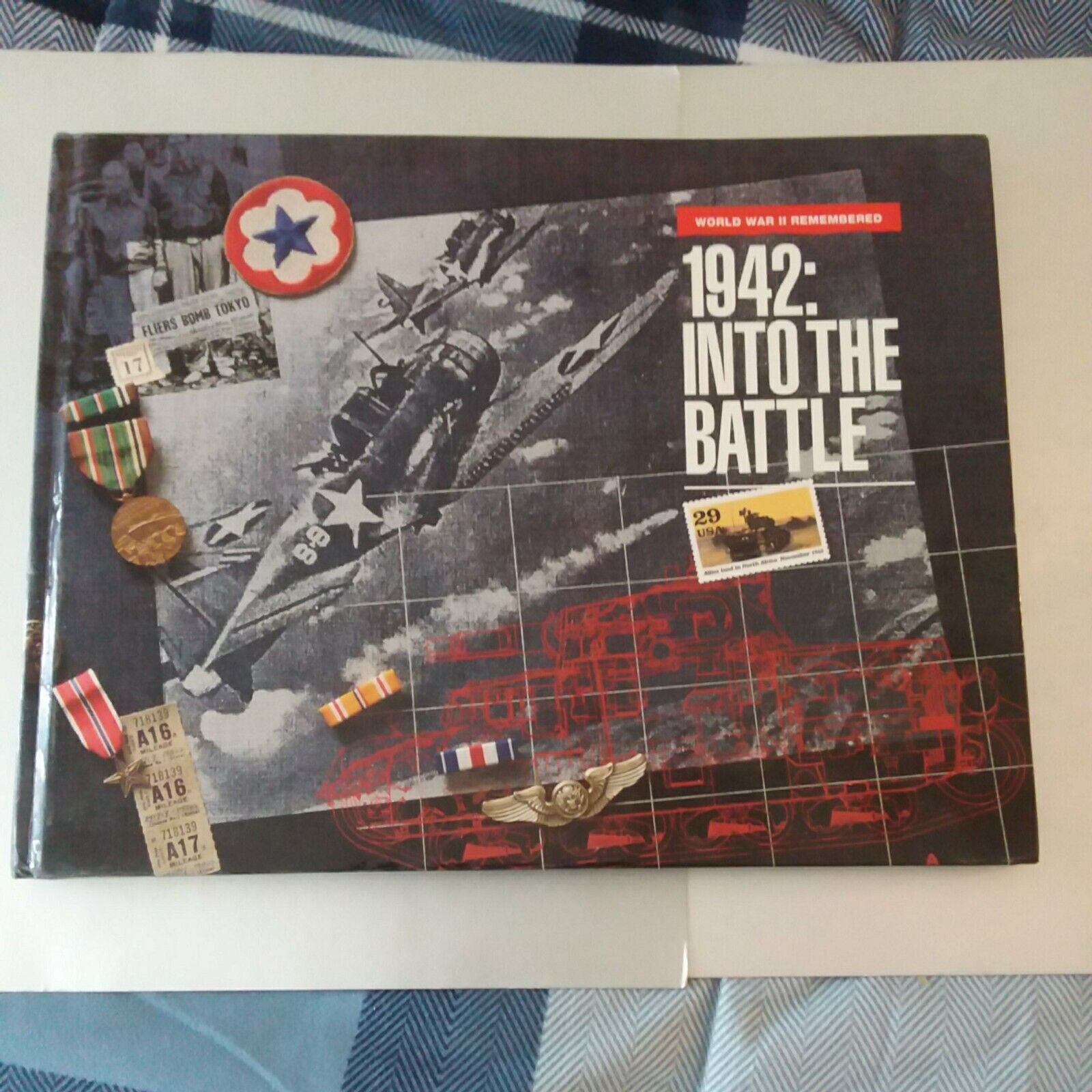 WWII 1942 INTO THE BATTLE BOOK WITH RELATED STAMPS