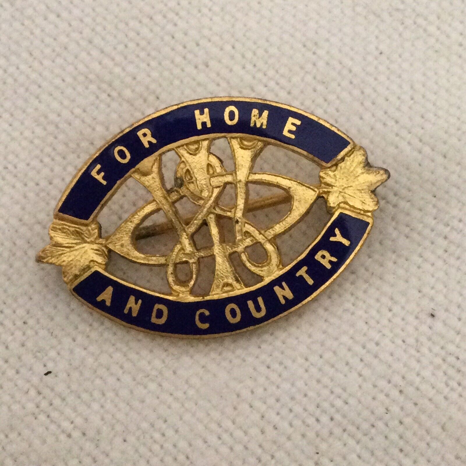 WW2 Era- For Home and Country, Birks, Oval Gilt & Navy Enamel pin
