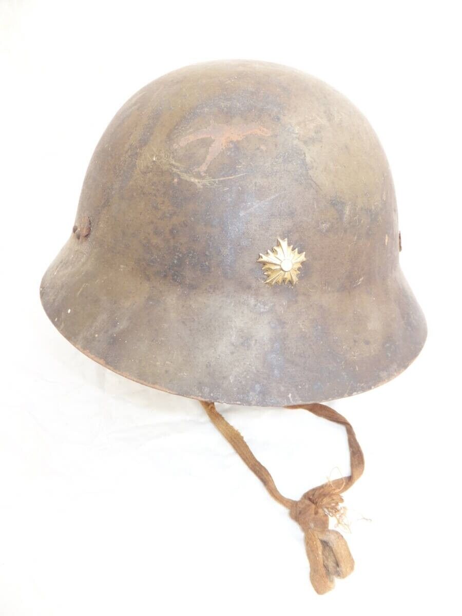 WW2 Japanese iron Helmet with cap badge, liner, chin strap , Dent  Original