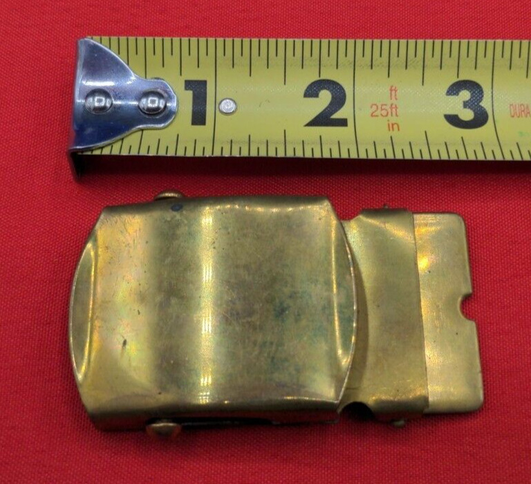 WWII/2 era US Army brass buckle for web belt marked solid brass.