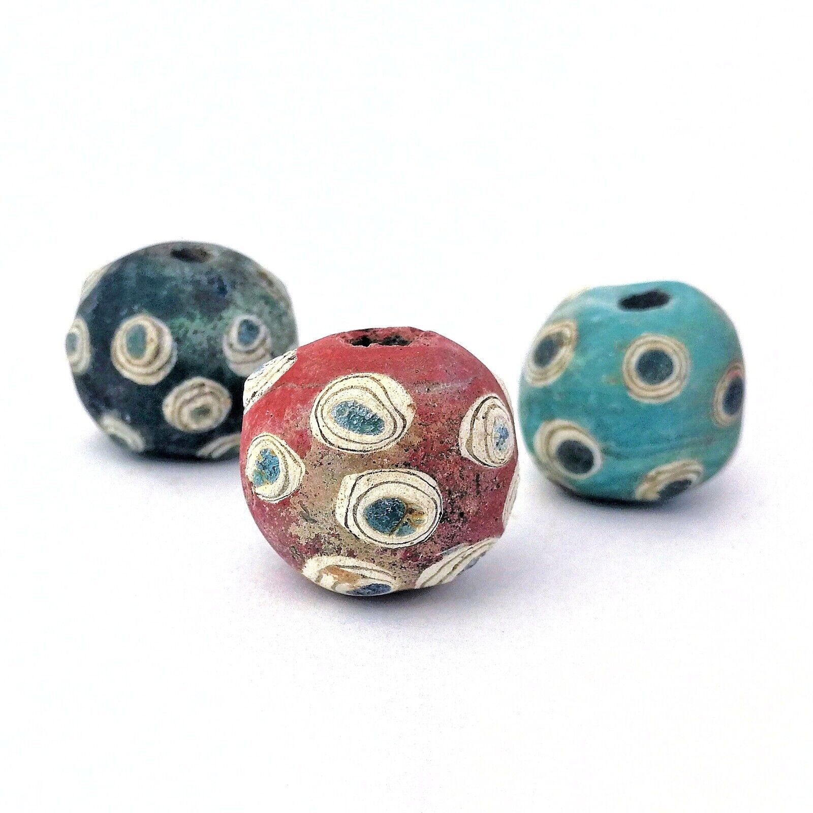 A warty cylindrical bead, 7 - 9 century