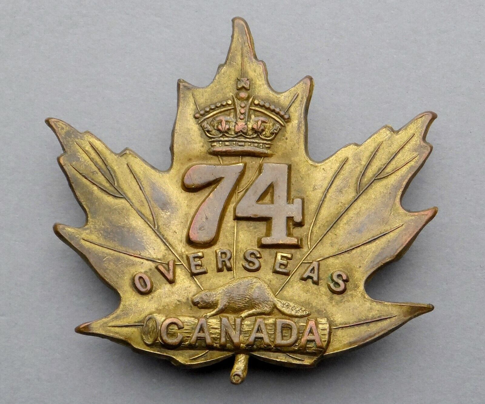Canada WWI. 74th Battalion Cap Badge. Overseas. P.W. Ellis & Co, 1915.