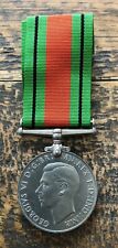 Genuine Vintage WW2 Defence Medal 1939-1945 with original ribbon picture