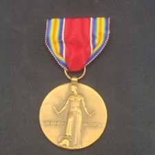 WWII/2 US WWII Victory Medal crimp broach. picture