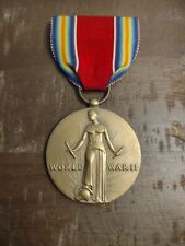 Authentic World War II Victory Medal Ribbon And Fastener picture