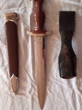 Pre WWII Dagger with both the original leather scabbard and belt loop. Rare picture