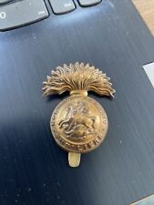 GENUINE WWI NORTHUMBERLAND FUSILIERS CAP BADGE. picture