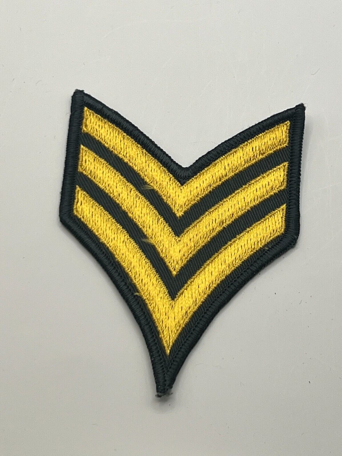 Military Army Chevron Sergeant 3 Gold Bar Embroidered Black Background.