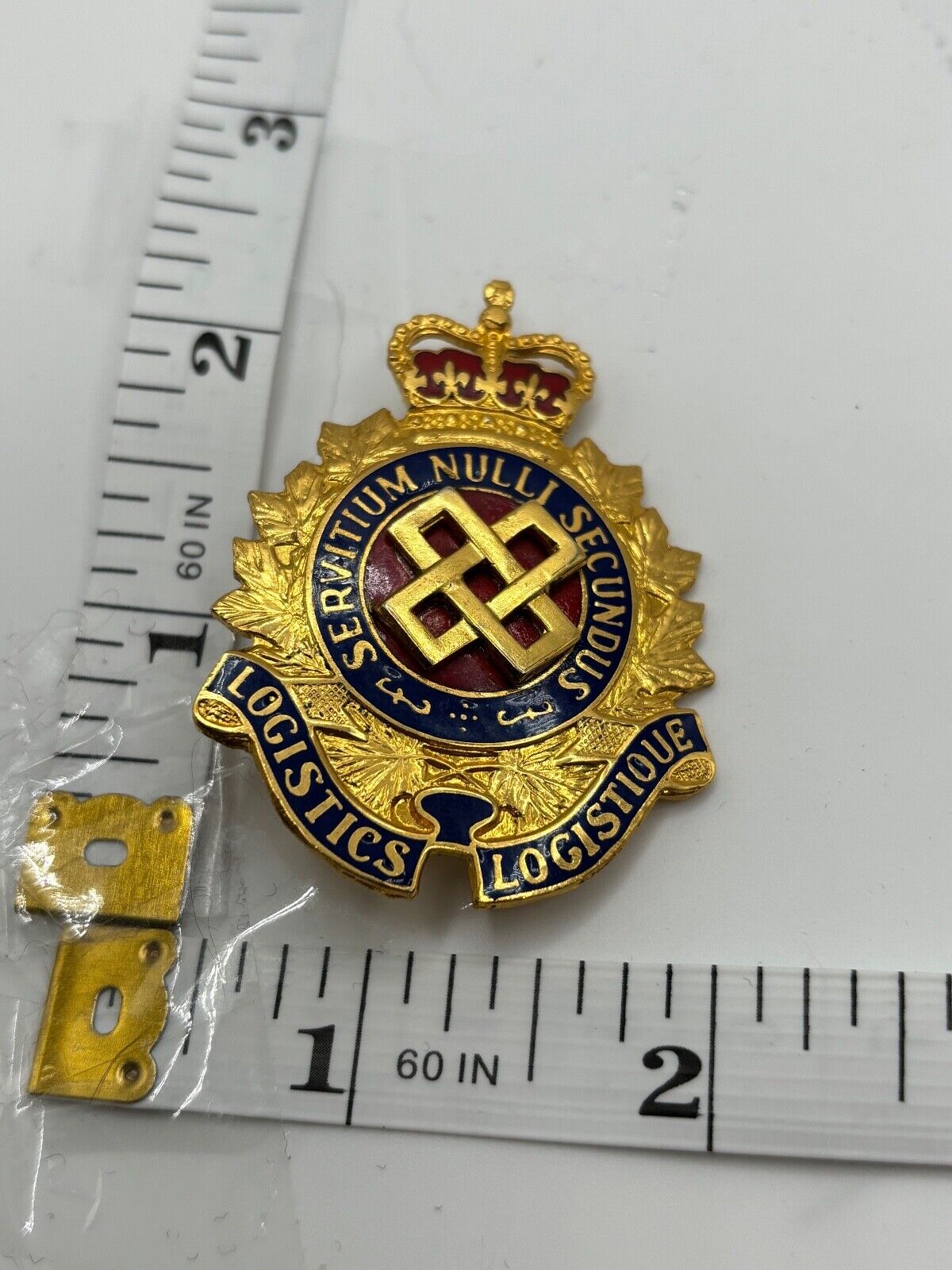 Canadian Forces Logistics Branch cap badge metal (no tang)