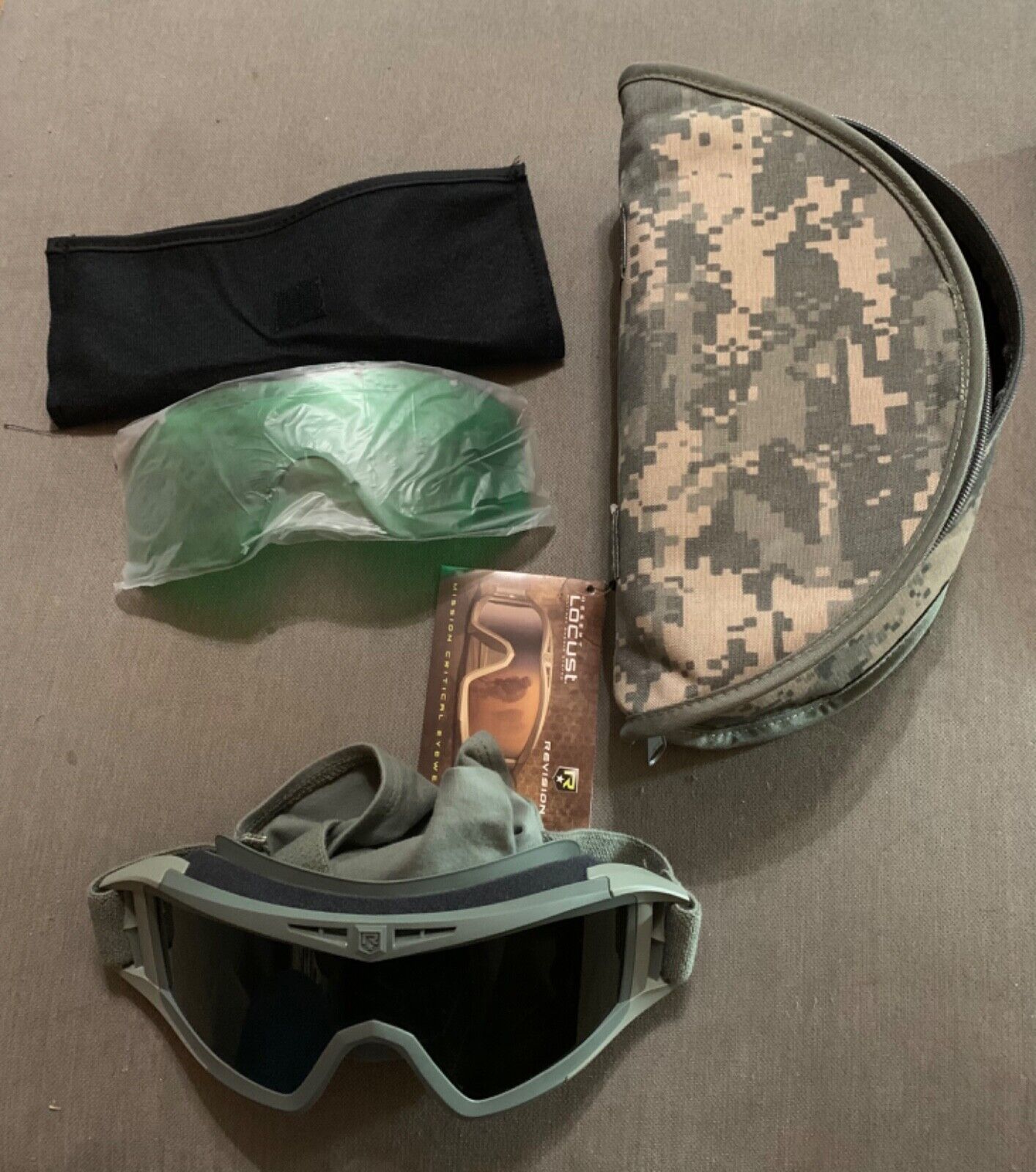 REVISION DESERT LOCUST GOGGLES, W/ Green and Amber Lens, NEW IN BAG