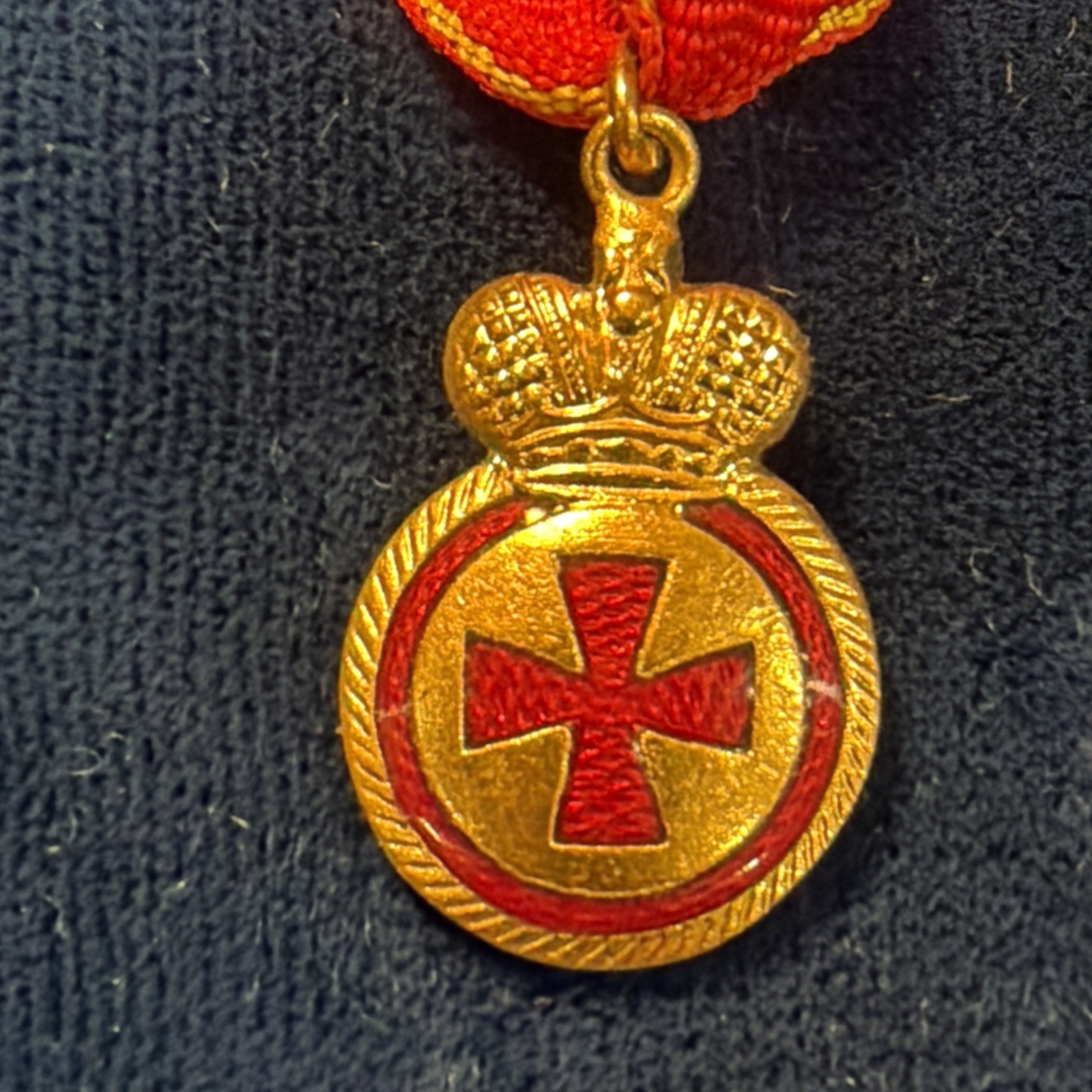 Miniature Medal of the Order of St.Anne on original miniature ribbon