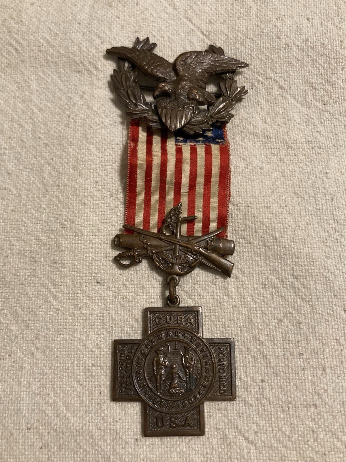 SPANISH AMERICAN WAR MEDAL NUMBERED  Veteran Association Badge