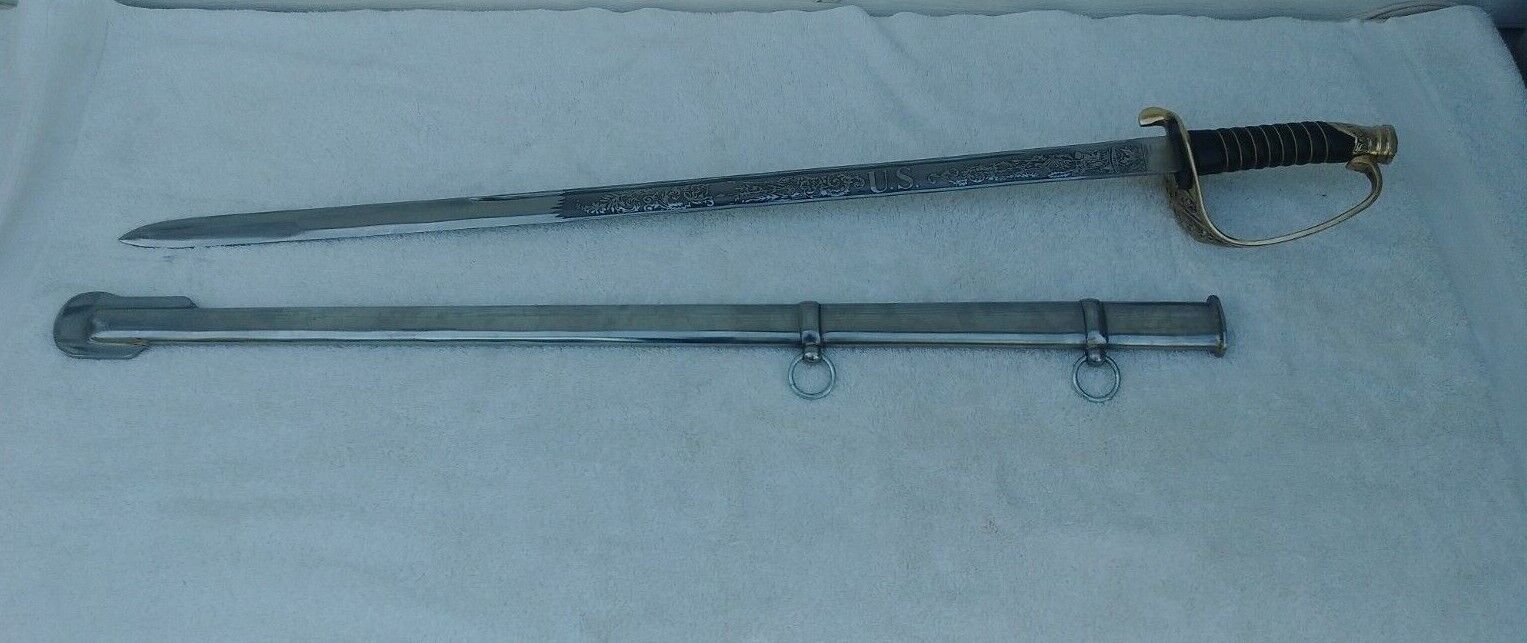CIVIL WAR UNION OFFICERS SWORD - MEASURES 37 INCHES BLADE - MEASURES 30 INCHES.