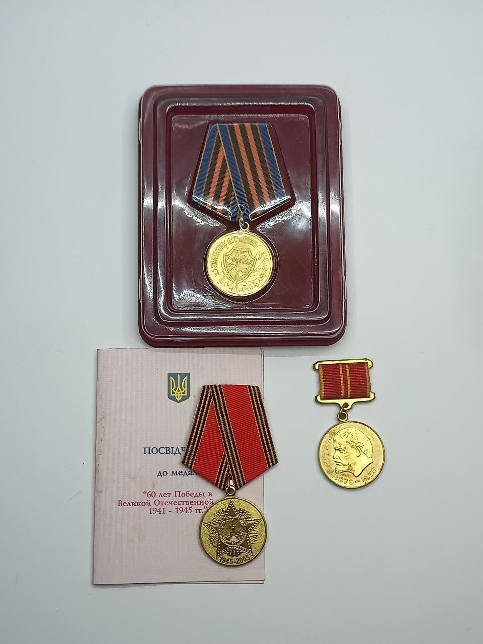 USSR Jubilee Defender of Ukraine Award Badges Brass Booklet and box Good cond
