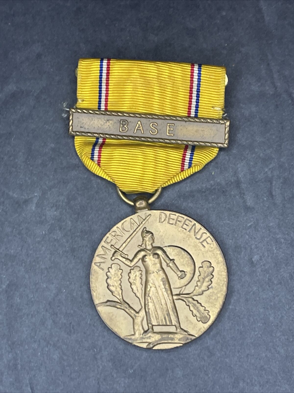 WWII American Defense medal with \'BASE\' clasp.