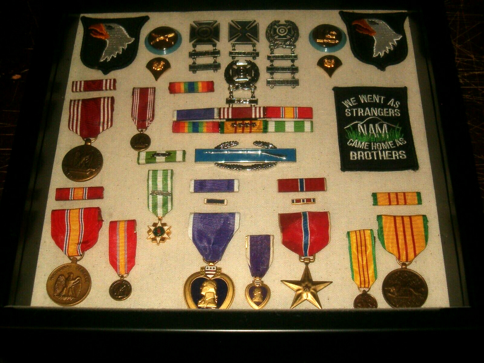 MILITARY MEDALS RARE FRAMED COLLECTION WITH PARTICIPANTS NAME ON THE BACK