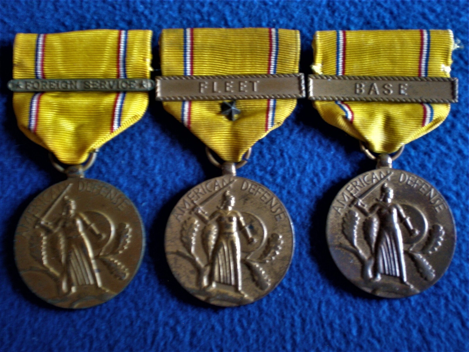 United States:  3 American Defense Medals w/bars: Foreign Service, Fleet & Base