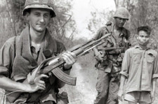 Vietnam  War  Photos --  Soldiers with Capture VC Prisoner....