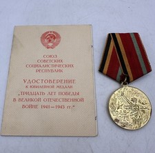 Vintage Jubilee medal and booklet from 1976, War 1941-1945 Year