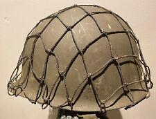 WWII original US Army M1 Helmet wide hole camouflage net. Lightly used  picture