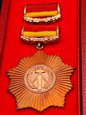 GDR VVO Patriotic Order of Merit bronze badge militaria in case