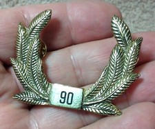 Heavy Hat Badge With Leaves. Unknown what this is for