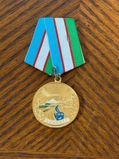 Uzbekistan medal for valiant labor numbered 148053