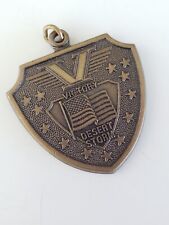 Vintage V Victory Desert Storm Brass Shield Shaped Medal picture
