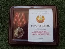 2022, Rare state award medal “30 Years of Repelling Aggression,” with document.