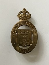 British 1915 On War Service munitions worker's lapel badge, numbered